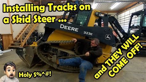 how to install rubber tracks on cat skid steer|installing tracks on skid steer.